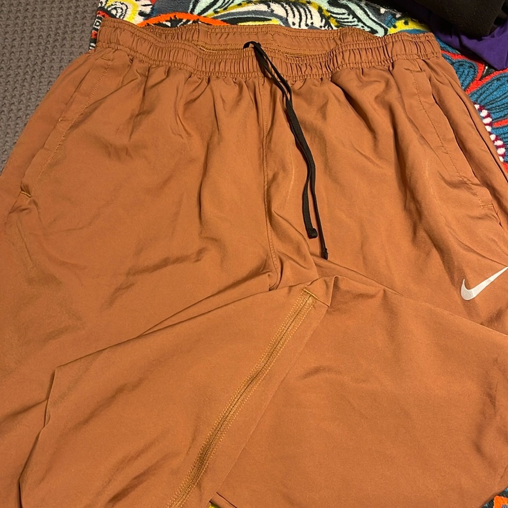 Nike Track dri-fit zipper ankle-reflective logo- center back concealed pocket-XL